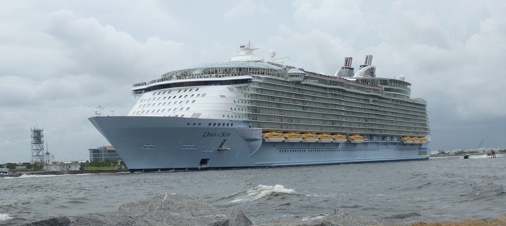 A large cruise ship sailing out of port