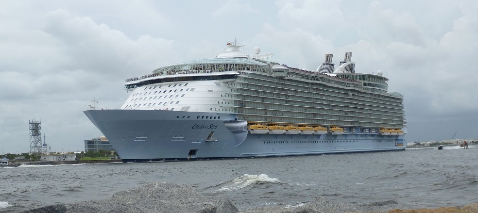 A large cruise ship sailing out of port